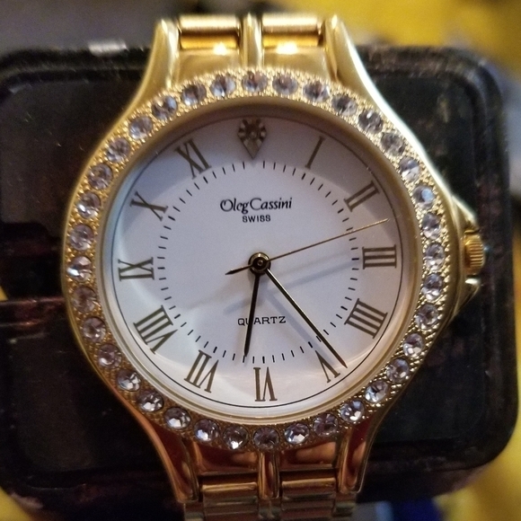 Oleg Cassini Accessories - Flawless Oleg Cassini women's watch iced out bezel